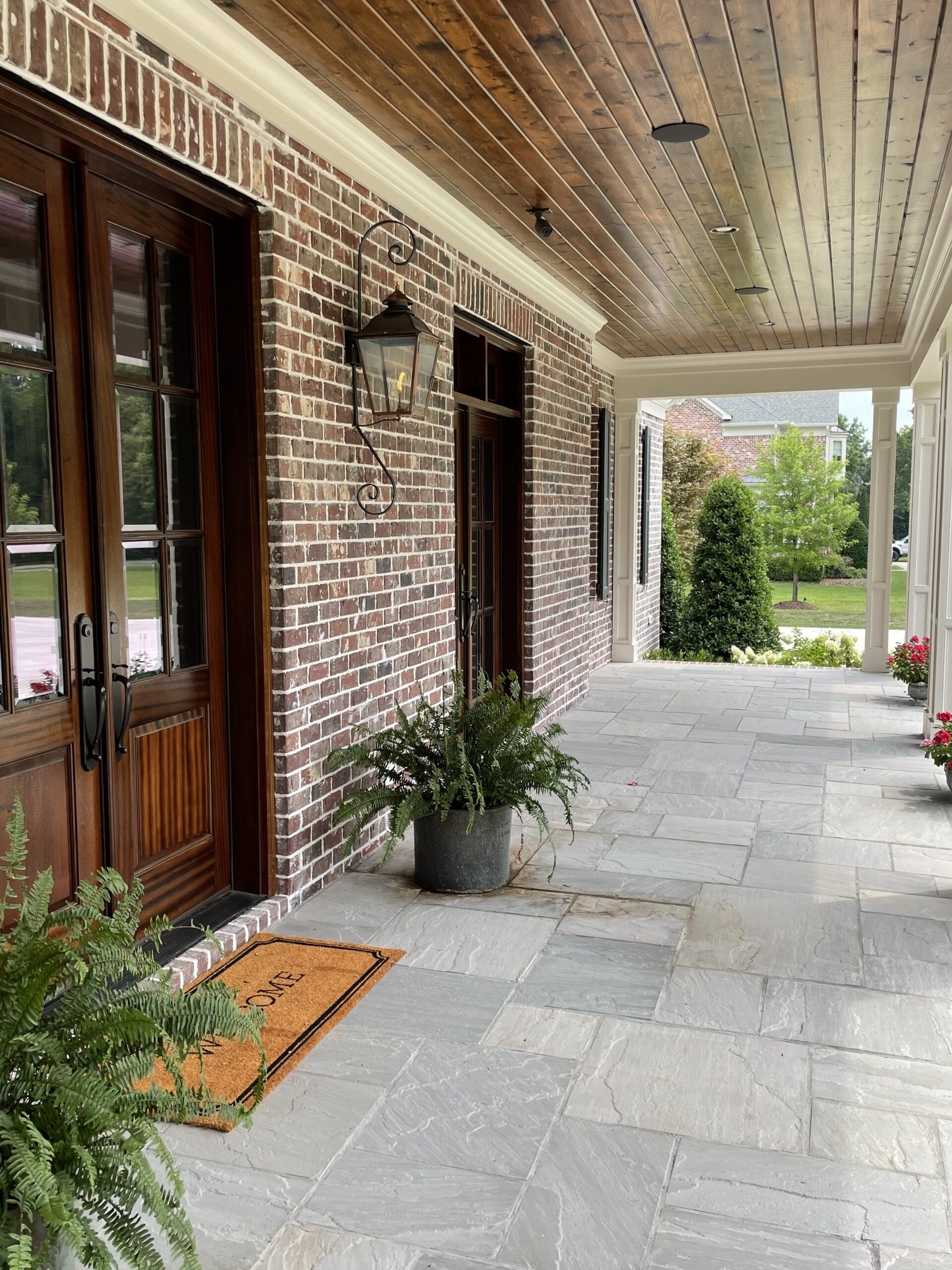 Side view of the front porch of a Nashville Custom Built Home from a Brentwood Home Builder who also does Home Improvements